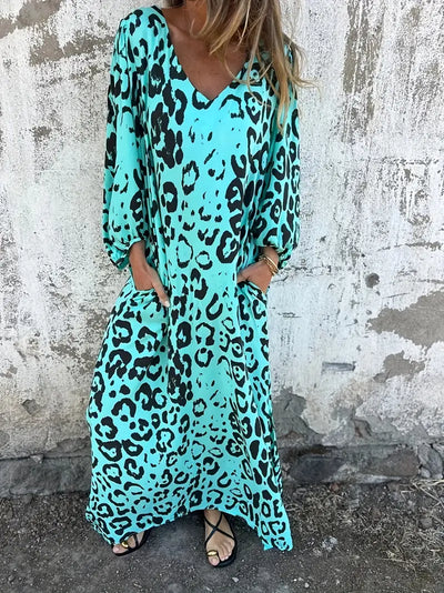 Beatrix | Ausgestelltes Maxikleid mit Animal-Print und fließender Linienführung